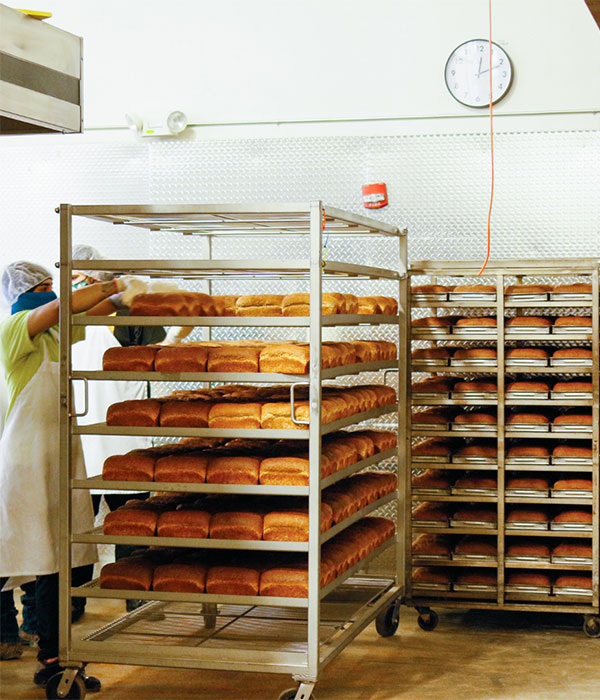 Loaves of Angelic Bakehouse Bread on Racks