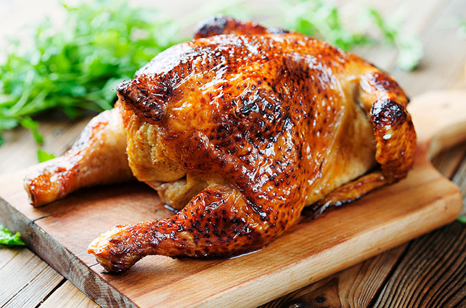 Whole Roasted Chicken on Cutting Board