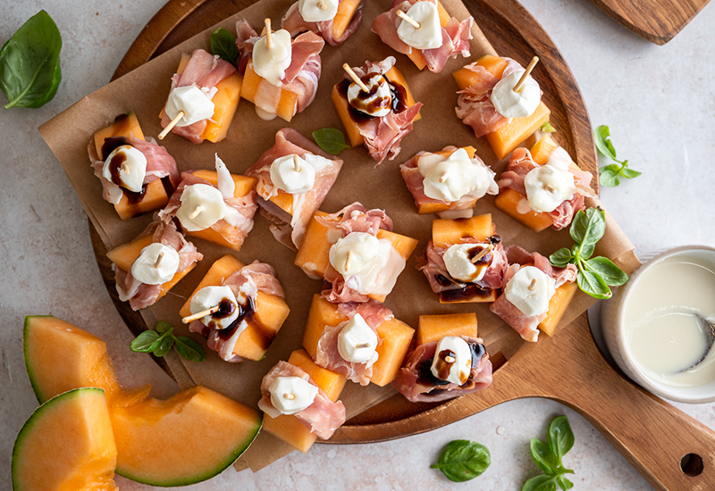 Prosciutto Melon Bites with Goat Cheese and Honey Drizzle