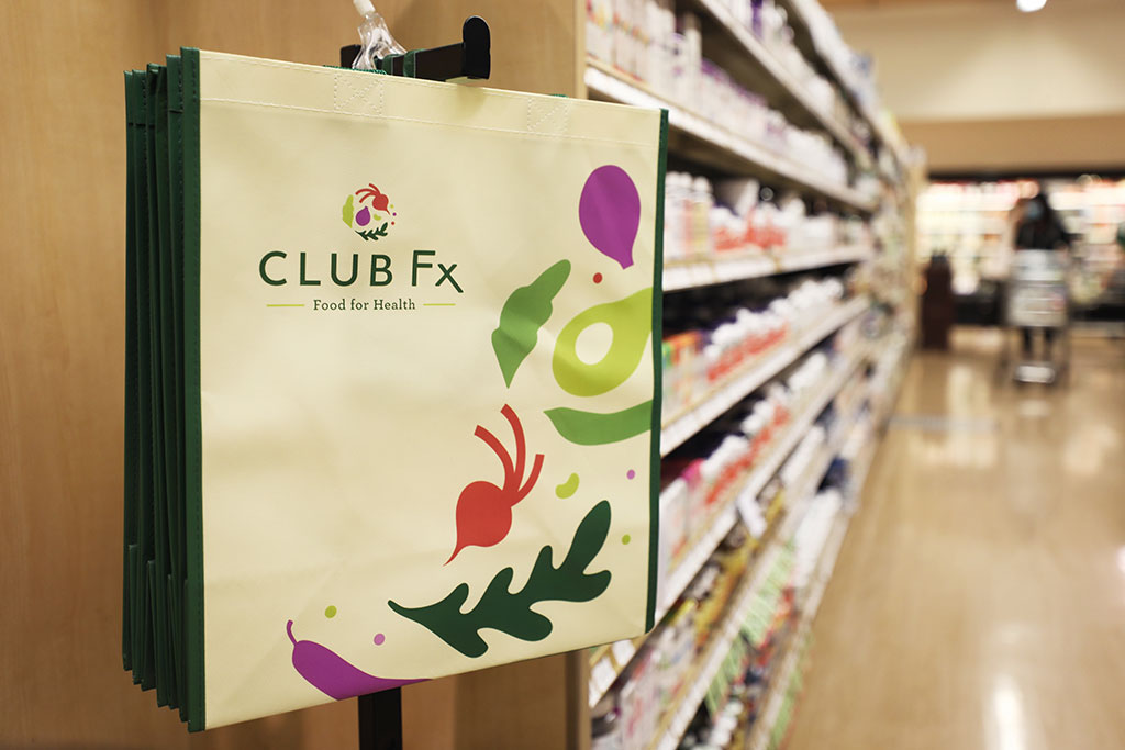 Heinen's Club Fx Tote Bag Hanging in the Wellness Aisle