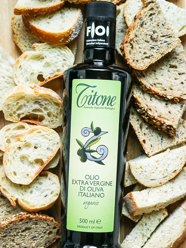 Extra Virgin Olive Oil Bottle with Bread Slices