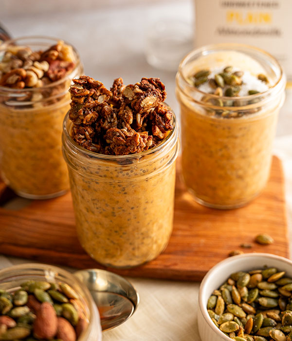 Pumpkin Chia Pudding in Small Glass Jars with Granola Topping
