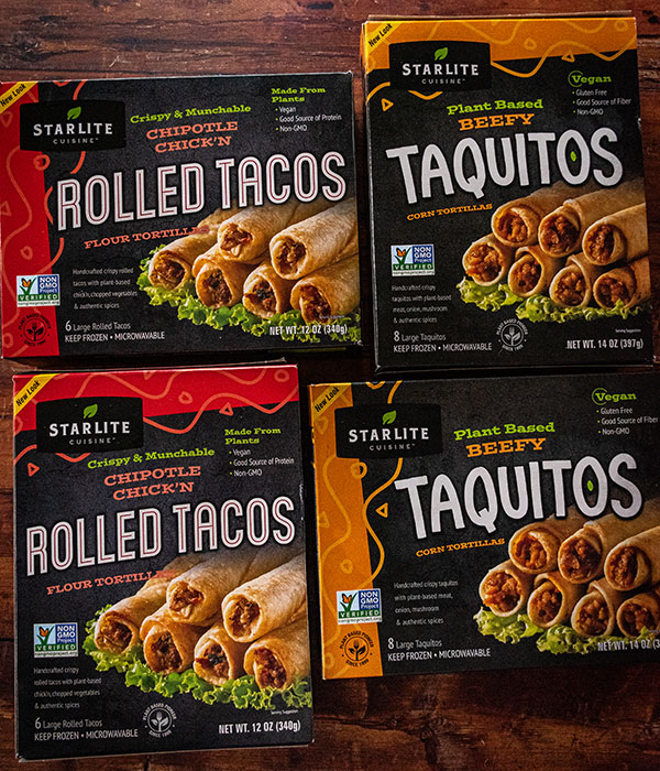 Starlite Cuisine Frozen Rolled Taco and Taquito Boxes on a Wood Surface