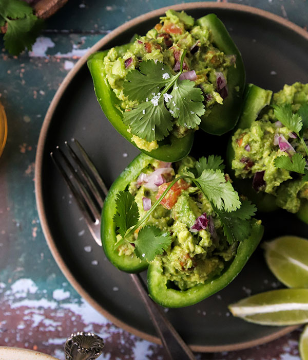 Plant Powered Guacamole Stuffed Peppers on a Plate
