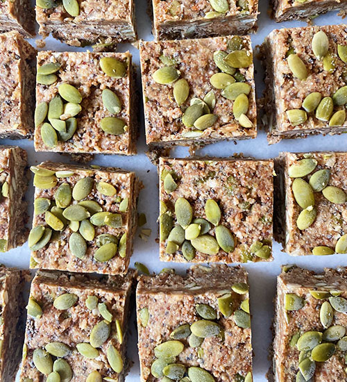 Maca Energy Bar Squares with a Nut Topping