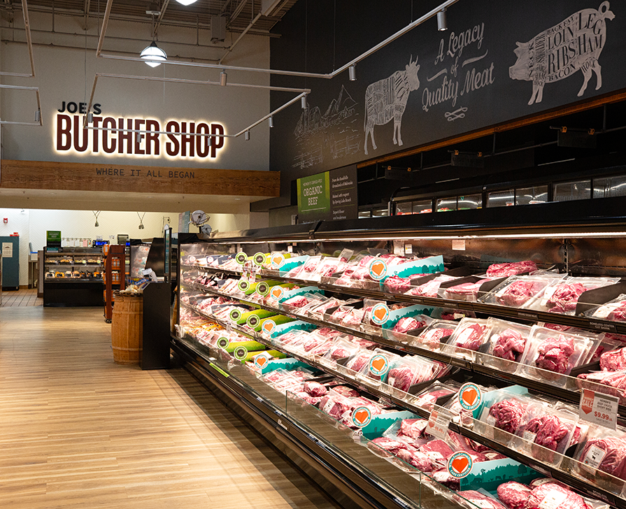 A wide shot image of Heinen's Meat Department featuring Joe's Butcher Shop Sign